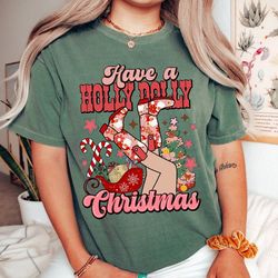 have a holly dolly christmas sweatshirt, santa dolly, retro christmas dolly parton shirt