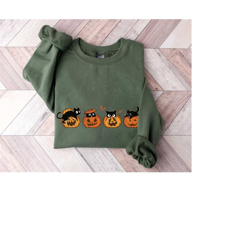 MR-2102023155453-black-cat-pumpkin-halloween-sweatshirt-and-hoodie-black-cat-image-1.jpg
