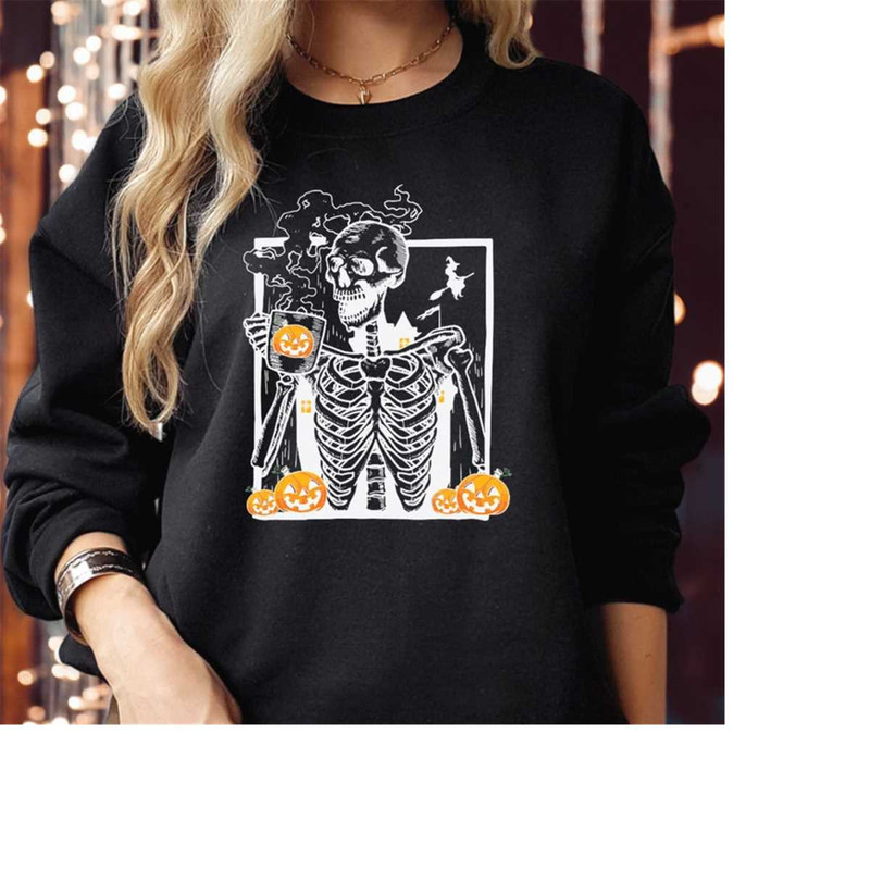 MR-2102023165628-sweatshirt-1801-hot-pumpkin-spice-coffee-drinking-skeleton-black-sweatshirt.jpg