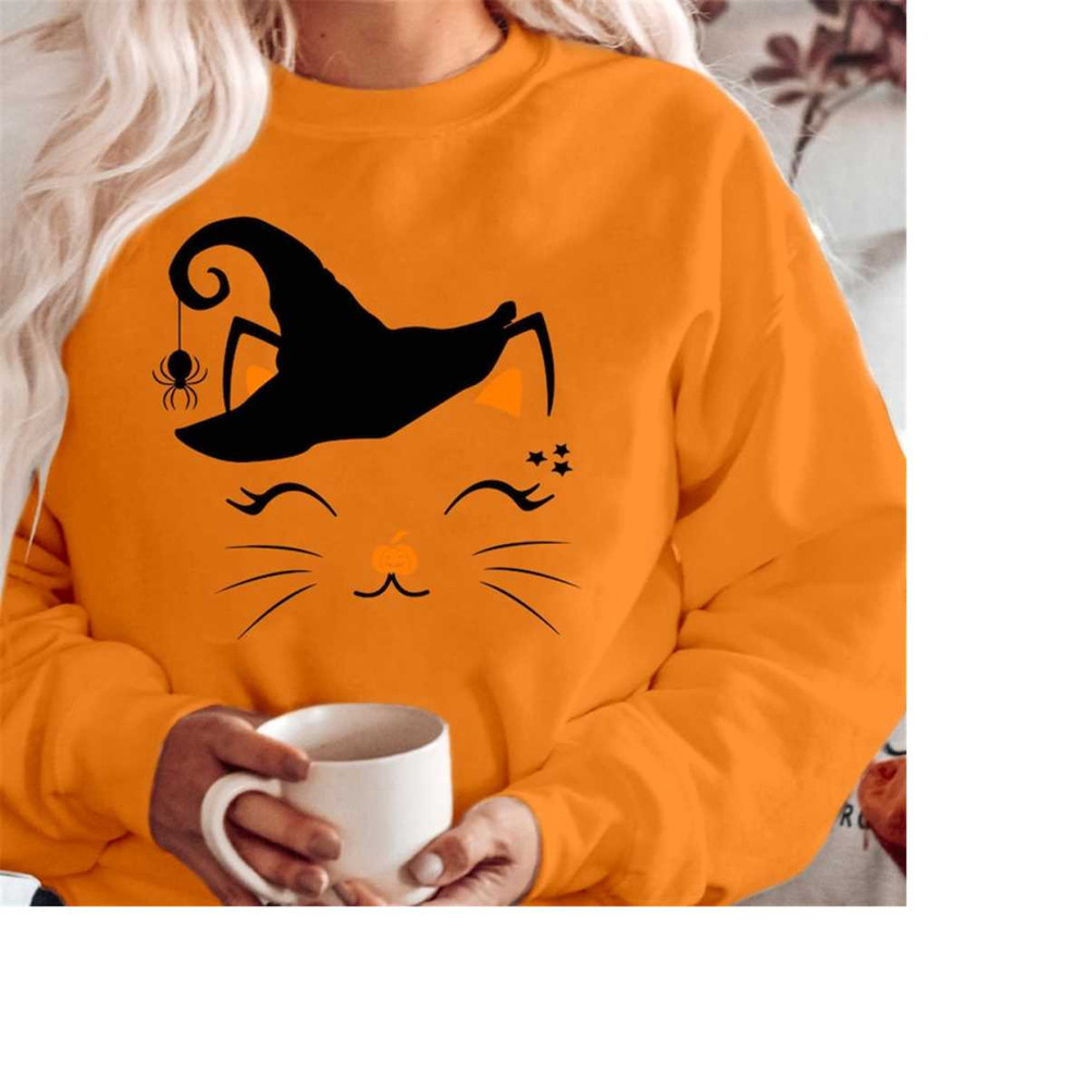 MR-310202383639-sweatshirt-1924-halloween-cat-face-spooky-season-boo-spider-orange-sweatshirt.jpg