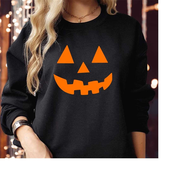 MR-310202385838-sweatshirt-1974-scary-pumpkin-face-jack-o-lantern-scary-black-orangelogo-swt.jpg