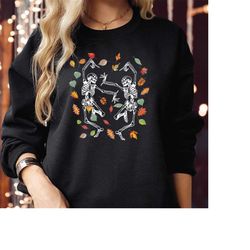 sweatshirt (1790) dancing skeleton with fall autumn leaves spooky season halloween vibes coffee drinking horror scary th