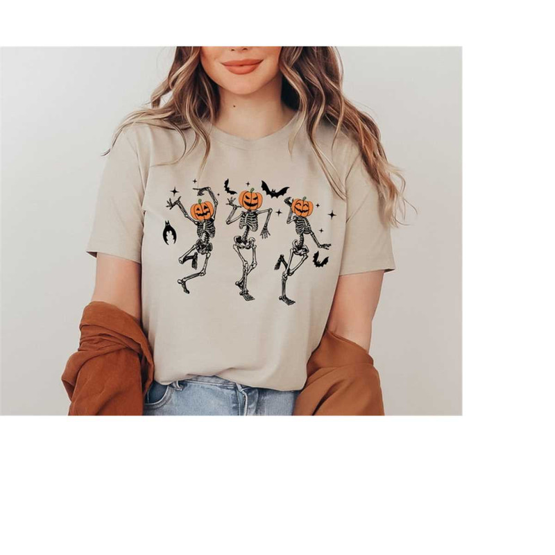 MR-3102023105424-dancing-skeleton-shirt-pumpkin-skeleton-graphic-tee-image-1.jpg