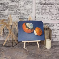 original oil painting, still life.. pumpkins on a blue background