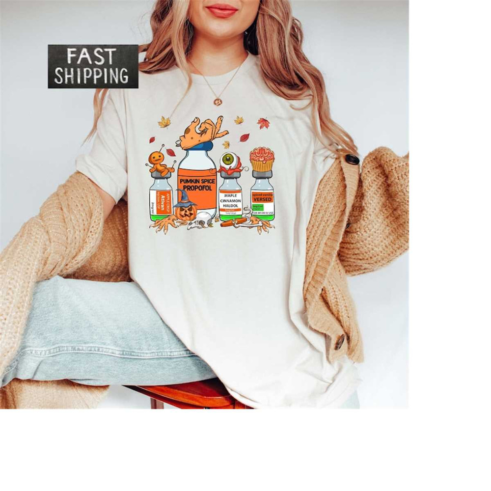 MR-3102023133256-spooky-nurse-t-shirt-halloween-nurse-pills-shirt-pumpkin-image-1.jpg