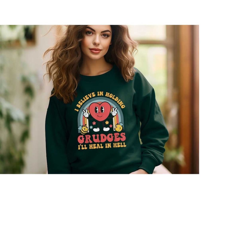 MR-410202382338-i-believe-in-holding-grudges-ill-heal-in-hell-sweatshirt-image-1.jpg