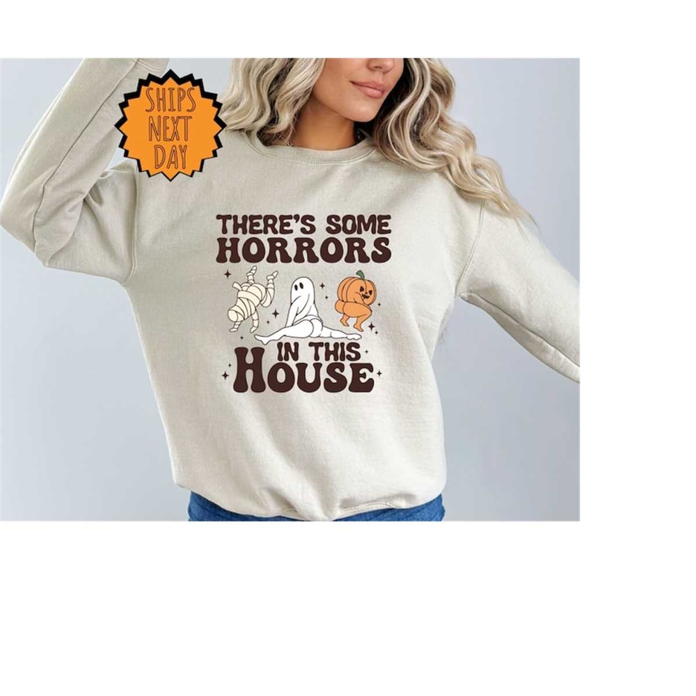MR-410202395757-theres-some-horrors-in-this-house-sweatshirt-halloween-image-1.jpg