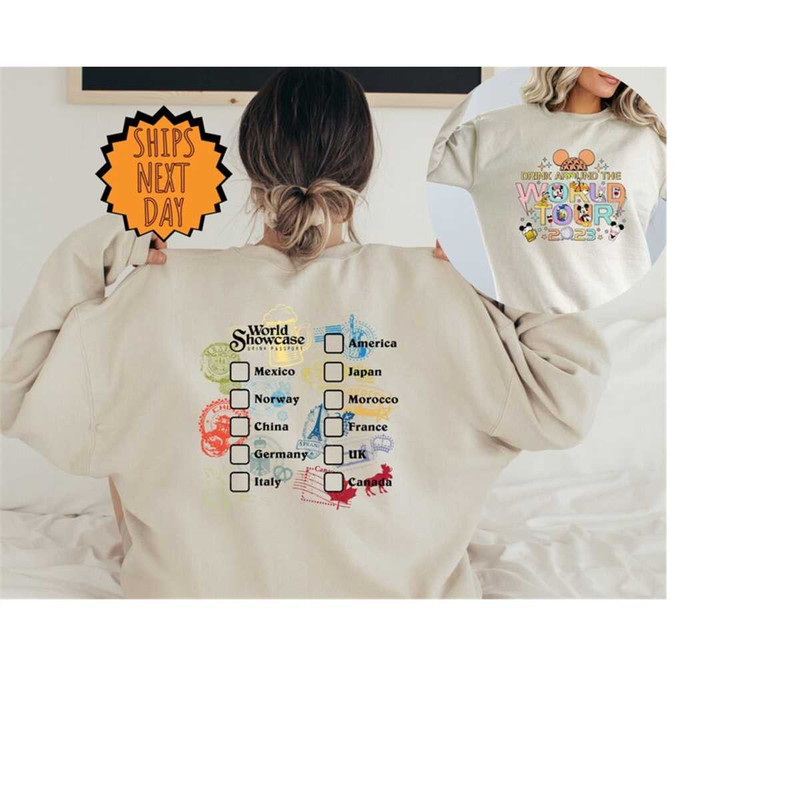MR-410202311119-drink-around-the-world-epcot-sweatshirt-epcot-world-tour-image-1.jpg