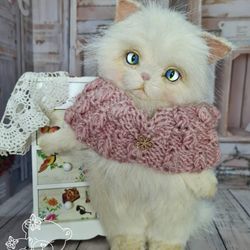 Plush cat. Cute fluffy cat. Gift idea. Plush toy.