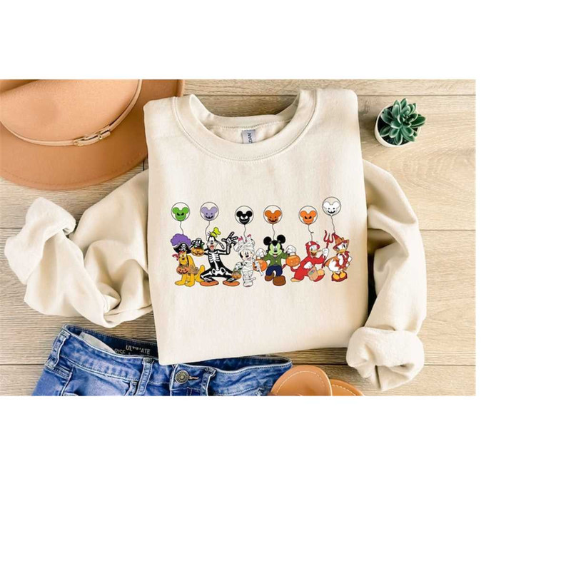 MR-5102023154610-magical-land-halloween-sweatshirt-mickey-balloons-trendy-image-1.jpg
