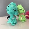 two crocheted dragons