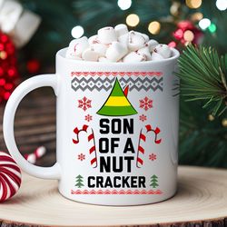 son of a nutcracker ugly christmas sweater coffee mug, elf christmas vacation mug