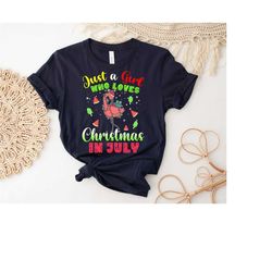 just a girl who loves christmas in july shirt, christmas flamingo shirt, family summer shirt, tropical christmas in july
