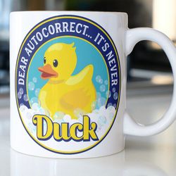 funny rubber duck coffee mug stating, dear autocorrect its never duck