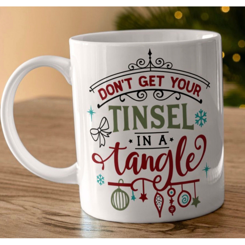 Funny Christmas mug stating “Don't get your tinsel in a TANGLE” - 1.jpg