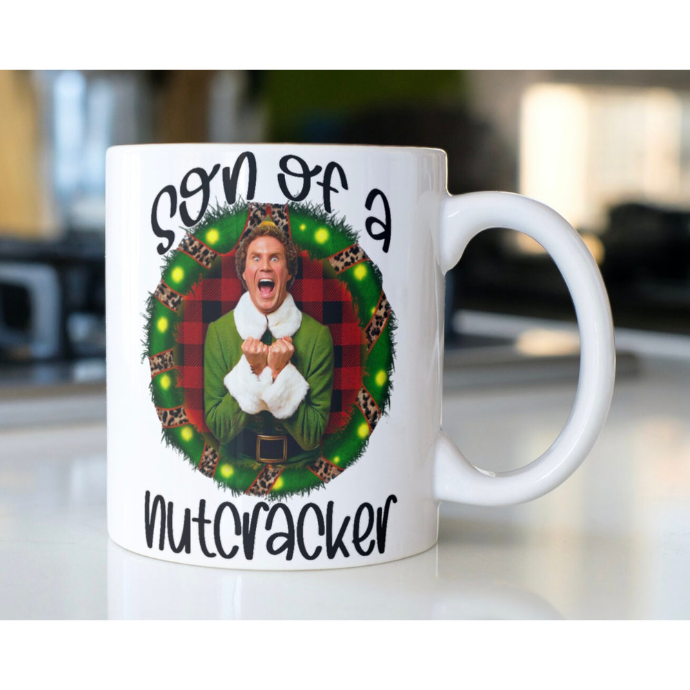 Funny Elf Christmas movie coffee mug stating,Son Of A Nutcracker - 1.jpg