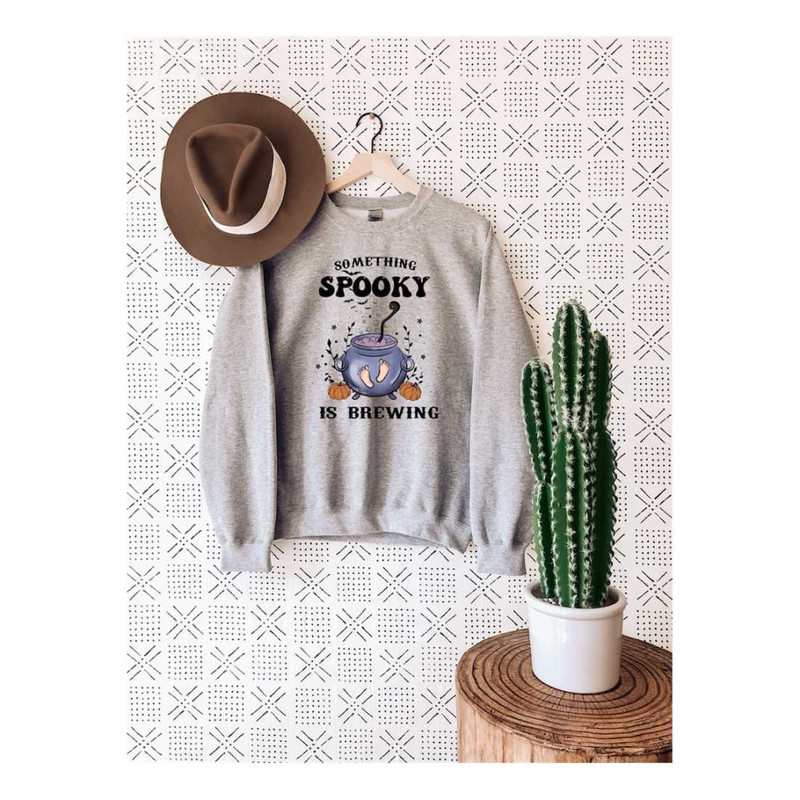 MR-7102023153350-something-spooky-is-brewing-sweatshirt-halloween-pregnancy-image-1.jpg