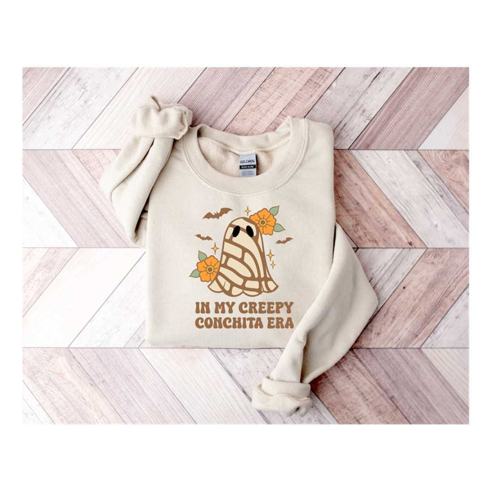 MR-7102023154115-in-my-creepy-conchita-era-sweatshirt-funny-latina-spooky-image-1.jpg