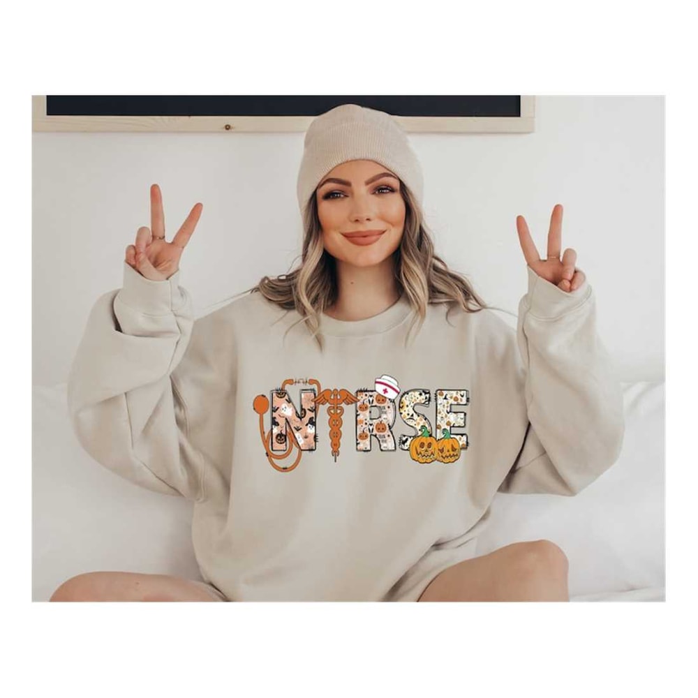 MR-7102023154627-halloween-nurse-sweatshirt-spooky-nurse-shirt-nurse-life-image-1.jpg