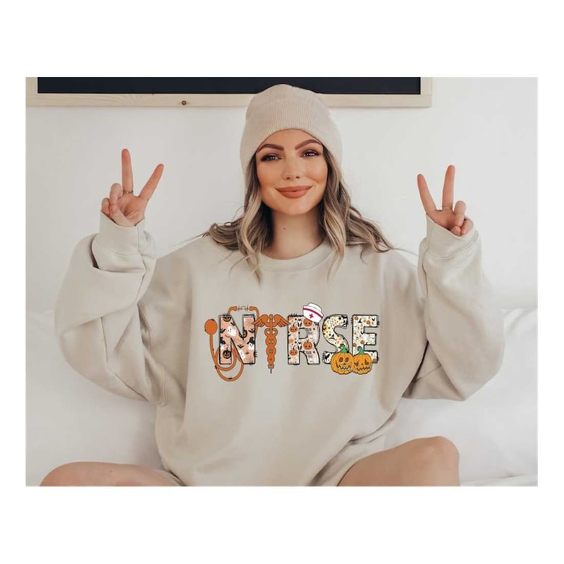 MR-7102023154627-halloween-nurse-sweatshirt-spooky-nurse-shirt-nurse-life-image-1.jpg
