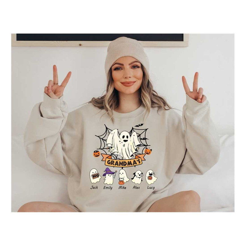 MR-7102023162618-personalized-grandma-halloween-sweatshirt-grandkids-name-image-1.jpg