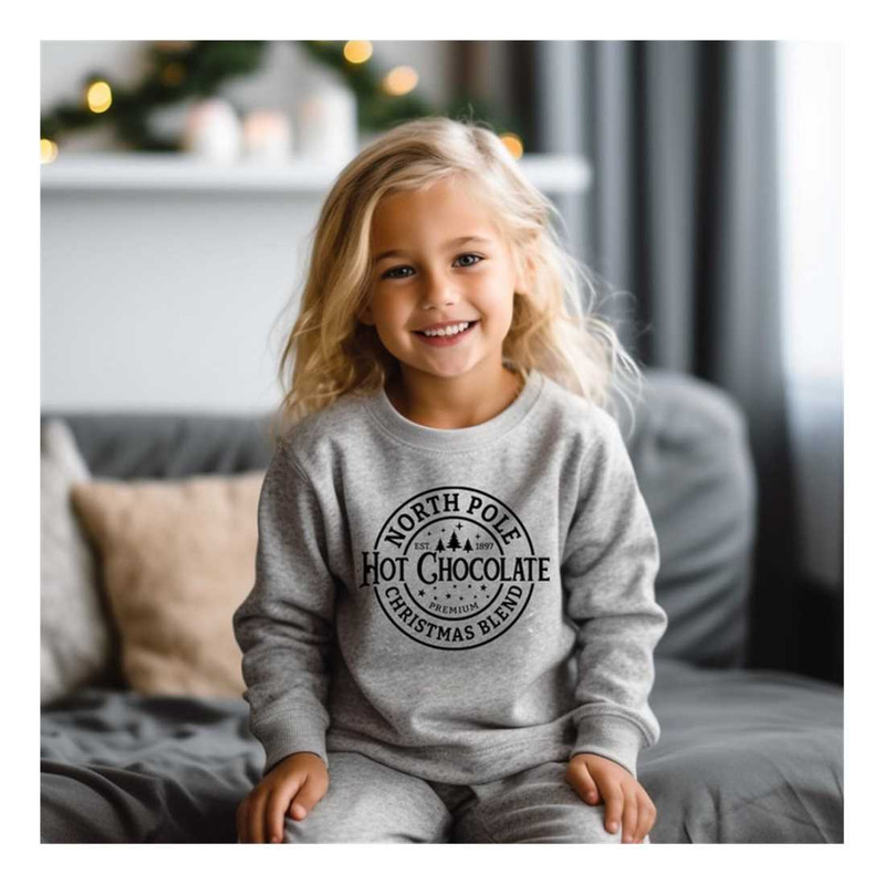 MR-7102023164422-north-pole-hot-chocolate-kids-sweatshirt-christmas-ugly-image-1.jpg