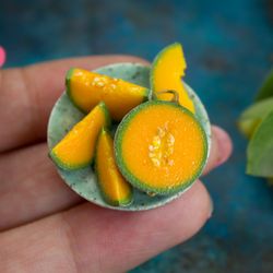 Miniature cantaloupe melon on a ceramic plate | Dollhouse miniatures
