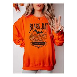 black bat apothecary sweatshirt, bat halloween shirt, halloween sweater, fall spooky hoodie