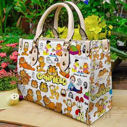 garfield leather bag,alice in wonderland lovers handbag,garfield women bags and purse