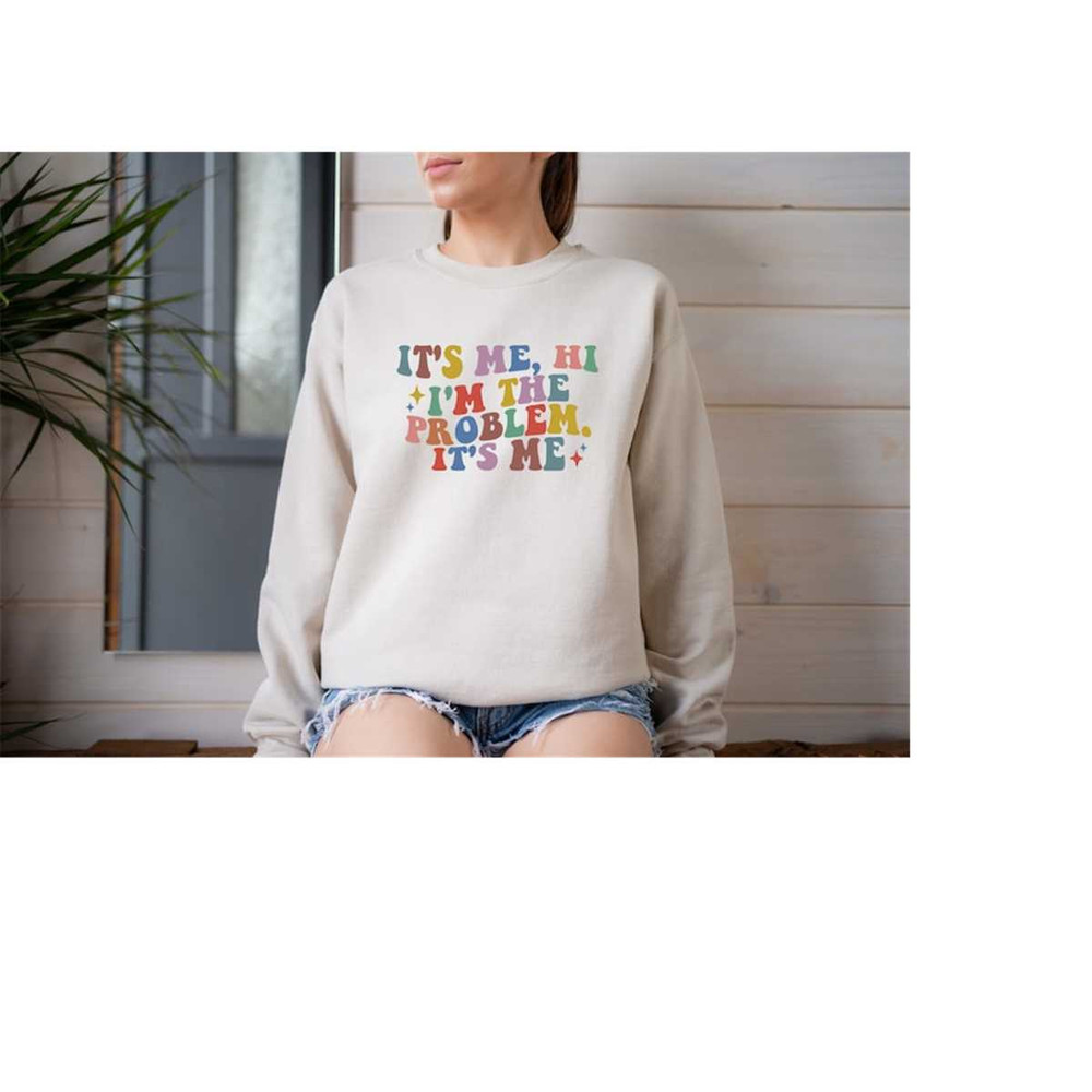 MR-10102023144237-its-me-hi-im-the-problem-its-me-sweatshirt-image-1.jpg