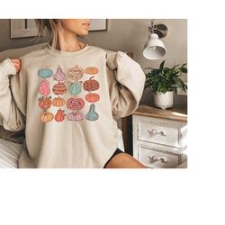 happy halloween pumpkin sweatshirt, pumpkin faces shirt, spooky pumpkin shirt, pumpkin variety, halloween gifts, fall pu