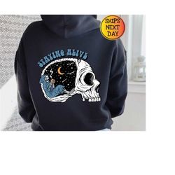 staying alive coffee skull hoodie, coffee lovers funny skeleton hoodie, trendy stay alive hoodie, vintage skull hoodie,