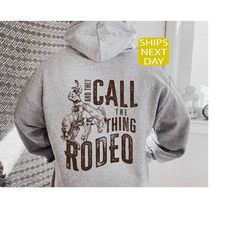 and they call the thing rodeo hoodie, rodeo hoodie, trendy hoodie, cowboy hoodie, western sweatshirt, retro western hood