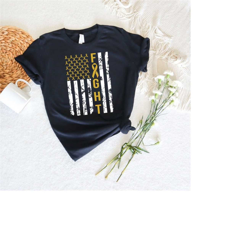 MR-12102023102414-gold-ribbon-stars-in-american-flag-t-shirt-childhood-cancer-image-1.jpg