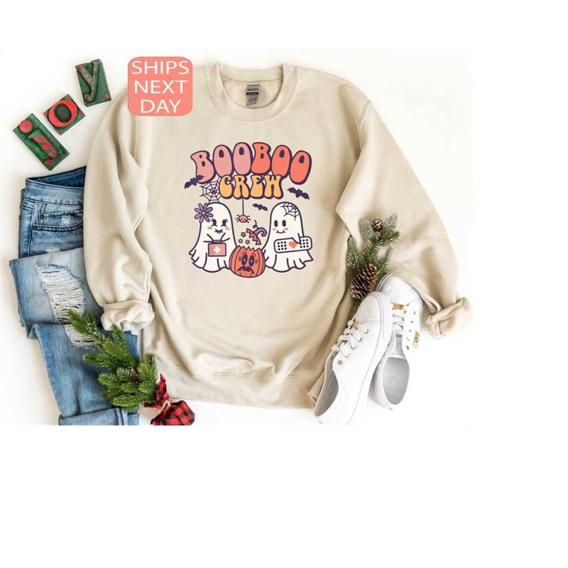 MR-12102023104529-boo-boo-crew-sweatshirt-halloween-nurse-sweatshirt-spooky-image-1.jpg