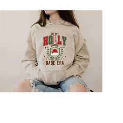 womens christmas hoodie, in my holly jolly babe era hoodie, trendy christmas sweatshirt, cute womens sweater, funny gift