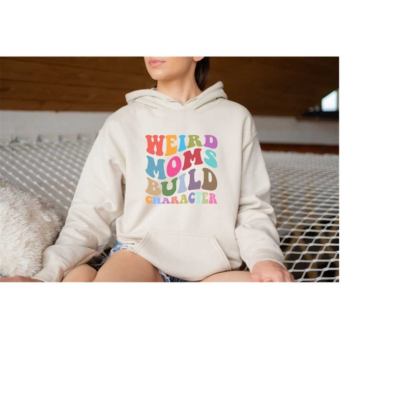 MR-13102023103628-weird-moms-build-character-hoodie-gifts-for-women-mothers-image-1.jpg