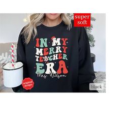 custom teacher christmas sweatshirt, christmas shirt for teacher team christmas shirt, in my merry teacher era shirt, te