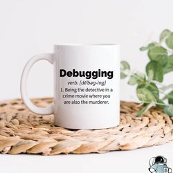 debugging definition coder coffee mug, funny programming computer developer or technician gift