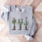 Christmas Sweatshirt,Santa Hat Cactus Christmas,Howdy Christmas Shirt,Funny Christmas Shirt,2022 Happy New Year,Christmas Gift,Christmas Tee.jpg