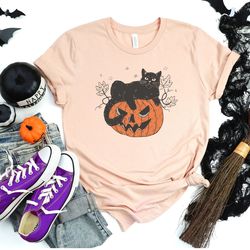 black cat on pumpkin shirt, sweater for fall, black cat shirt, halloween black cat design, halloween gifts for cat owner