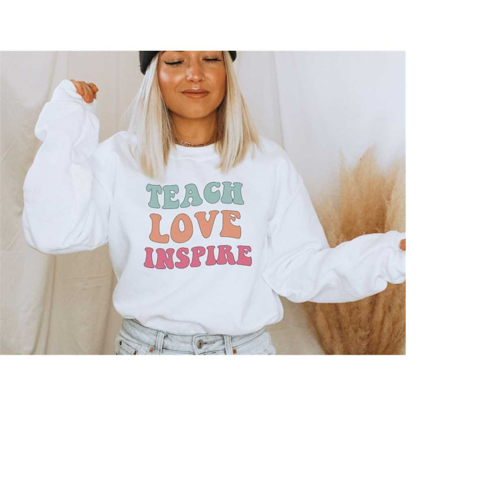 MR-1610202394728-teach-love-inspire-teacher-sweatshirt-inspirational-teacher-image-1.jpg