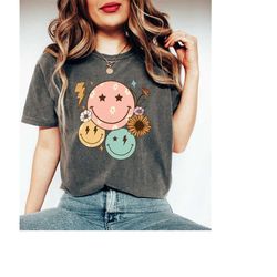 comfort colors vintage flower smiley face t-shirt,retro smiley face shirt,lightning bolt smiley face shirt,positive shi