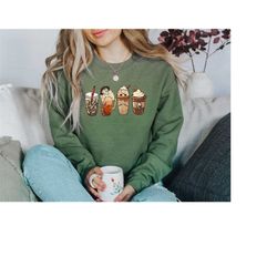 horror movie character coffee cups halloween sweatshirt, scary movie serial killers halloween sweatshirt, michael myers