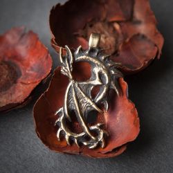 Dragon pendant on black leather cord. Gothic snake necklace. Viking handcrafted jewelry. Scandinavian mythology