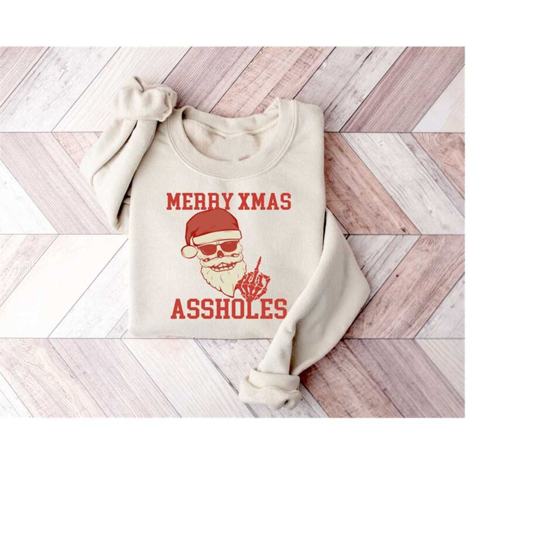 MR-16102023145921-merry-christmas-assholes-skeleton-hand-sweatshirt-gift-for-image-1.jpg