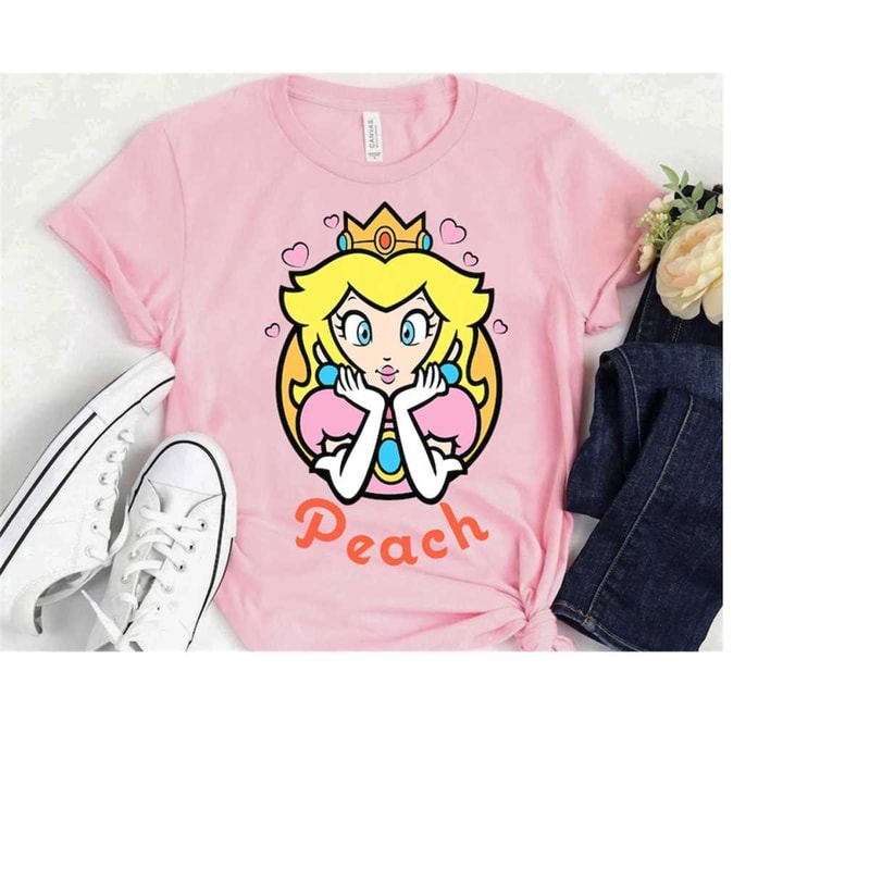MR-16102023163148-nintendo-super-mario-princess-peach-portrait-graphic-t-shirt-image-1.jpg