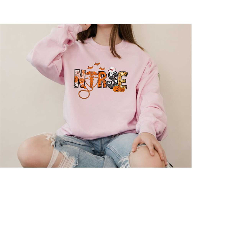 MR-1710202385248-halloween-nurse-sweatshirt-halloween-nursing-hoodie-nurse-image-1.jpg
