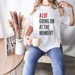 glitter concert t-shirt, a lot going on at the moment glitter effect shirt, feeling 22 shirt featured at the concert