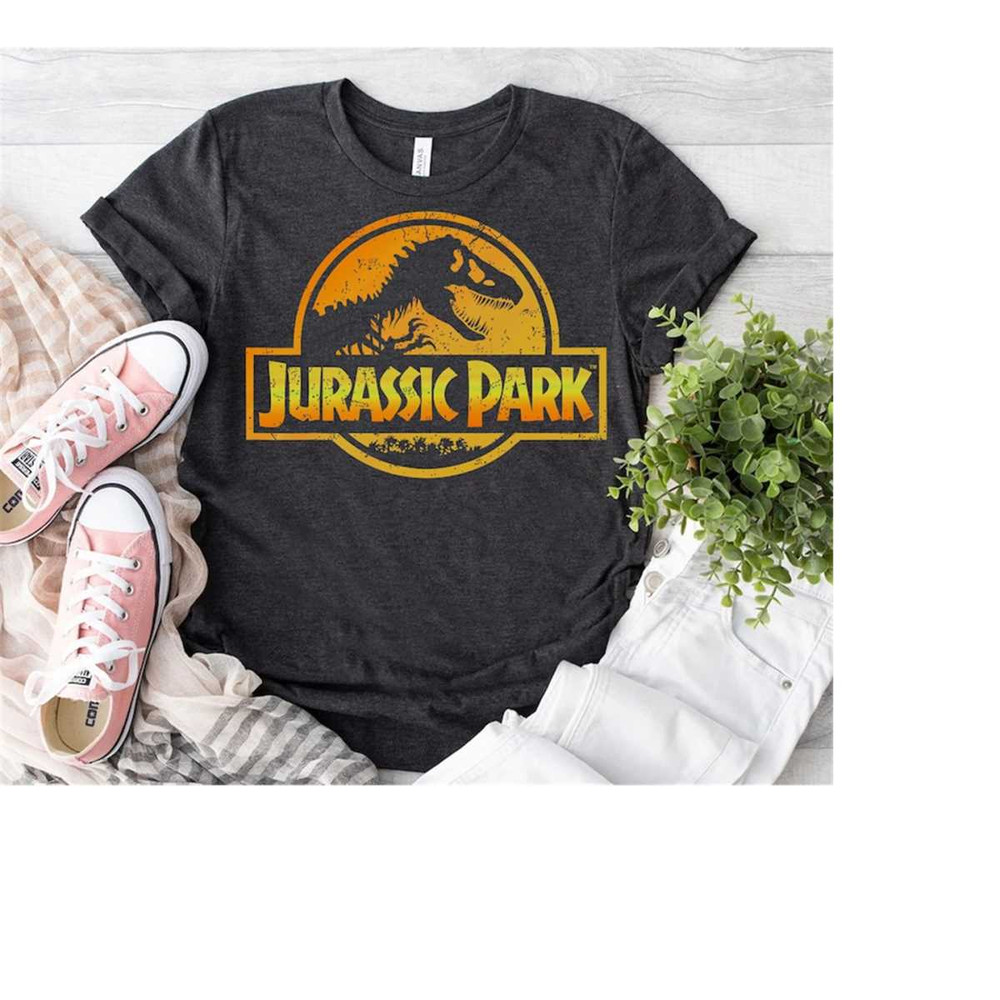 MR-1810202385843-jurassic-park-orange-yellow-gradient-logo-graphic-t-shirt-image-1.jpg